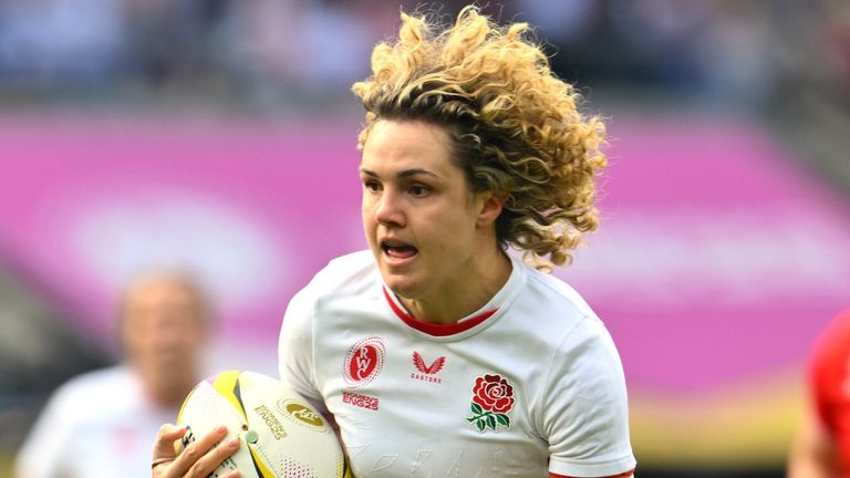 England's Ellie Kildunne runs to score a try during the Women's Rugby World Cup final match between England and Canada at the Allianz Stadium, Twickenham in London, Saturday, Sept. 27, 2025.(AP Photo/Anthony Upton)