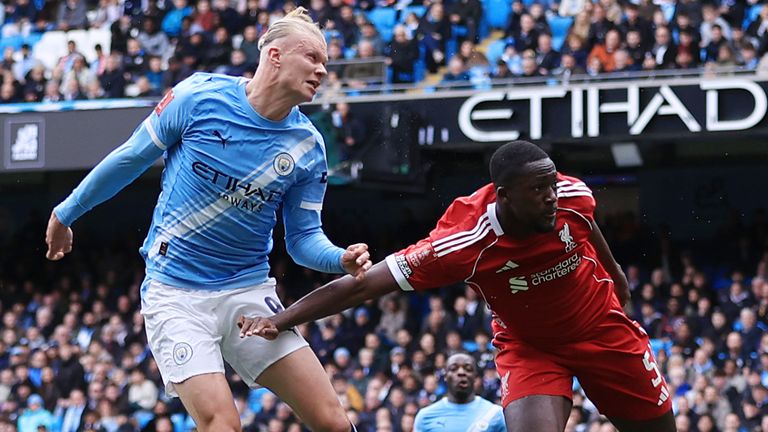 Erling Haaland heads Manchester City into a 2-0 lead against Liverpool