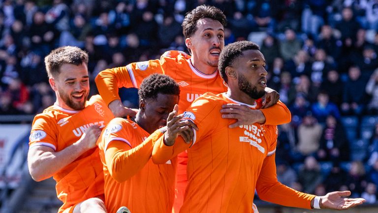 FALKIRK, SCOTLAND - APRIL 11: Rangers' Youssef Chermiti (R) celebrates with Nico Raskin, Djeidi Gassama and Bojan Miovski (L-R) after scoring to make it 5-3 during a William Hill Premiership match between Falkirk and Rangers at The Falkirk Stadium, on April 11, 2026, in Falkirk, Scotland. (Photo by Alan Harvey / SNS Group)