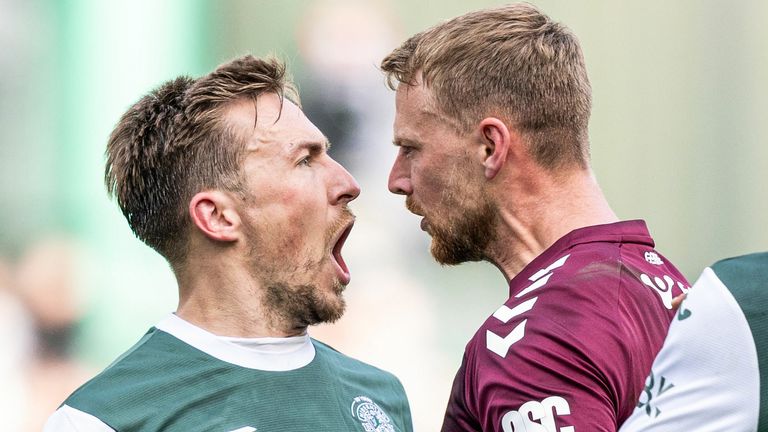 Hibernian's Felix Passlack and Hearts' Stephen Kingsley clash during the Edinburgh derby at Easter Road