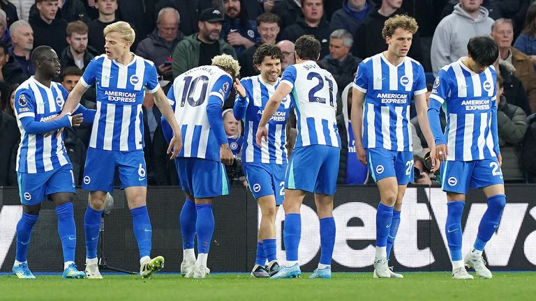 Ferdi Kadioglu (c) celebrates after giving Brighton the lead against Chelsea