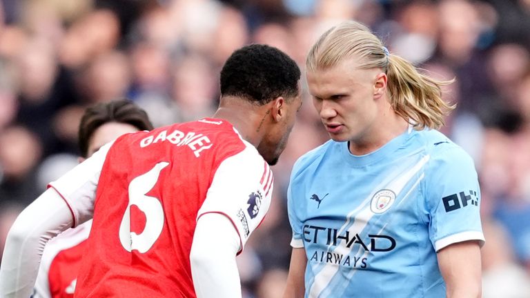 Tempers fray between Arsenal's Gabriel Magalhaes (left)and Manchester City's Erling Haaland 