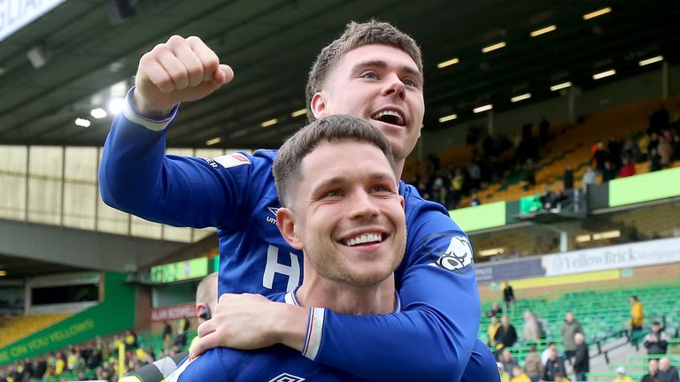 Ipswich Town's George Hirst and Leif Davis celebrate following the 2-0 win over local rivals Norwich at Carrow Road