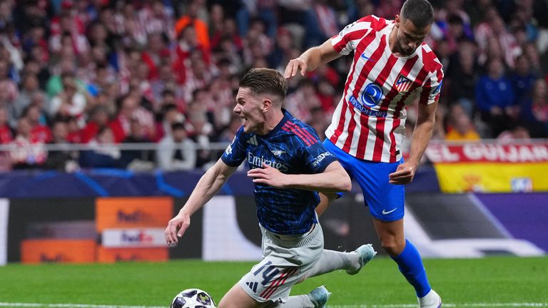 Atletico Madrid's David Hancko fouls Arsenal's Viktor Gyokeres