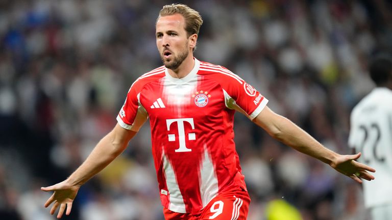 Harry Kane celebrates scoring Bayern Munich's second goal at Real Madrid