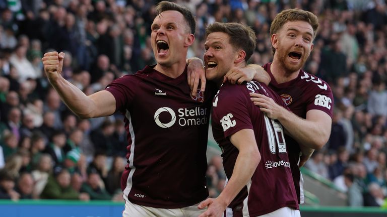 Hearts won 2-1 at Hibernian to move three points clear at the top