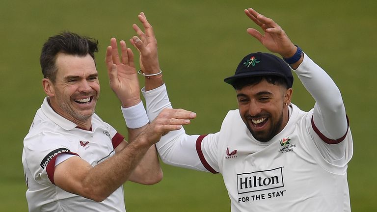 James Anderson celebrates a County Championship wicket with Lancashire team-mate Ajeet Singh Dale (Getty Images)