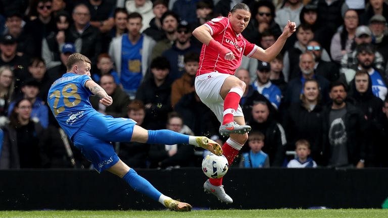 Birmingham City's Jay Stansfield (left) has a shot at goal