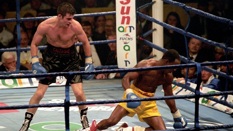Chris Eubank hits the canvas during tonight's (Sat)  WBO Super Middleweight Championship Title fight in Sheffield. Joe Calzaghe (left) won the match on a unanimous points decision. Photo John Giles.PA.