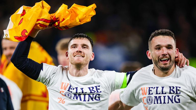 GLASGOW, SCOTLAND - NOVEMBER 18: Scotland's Andy Robertson (L) and John McGinn celebrate at full time during a FIFA World Cup 2026 Qualifier between Scotland and Denmark at Hampden Park, on November 18, 2025, in Glasgow, Scotland. (Photo by Ross Parker / SNS Group)