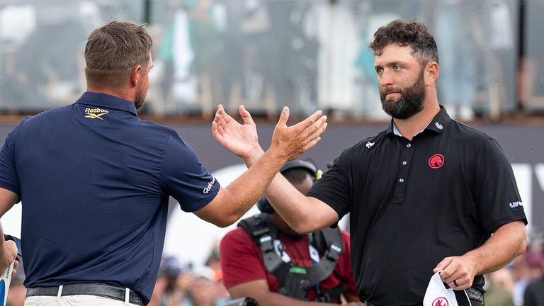 Captain Bryson DeChambeau of Crushers GC and Captain Jon Rahm of Legion XIII embrace after the final round of LIV Golf South Africa 