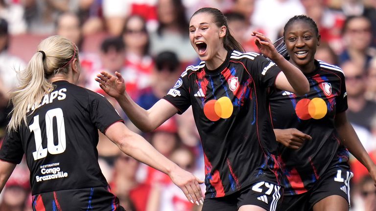 Lyon's Jule Brand celebrates scoring the opening goal of the game
