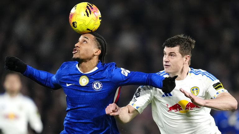 Jaka Bijol battles with Joao Pedro for the ball