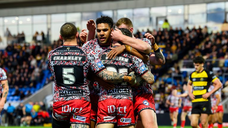 Picture by Allan McKenzie/SWpix.com - 17/04/2026 - Rugby League - Betfred Super League Round 8 - York Knights v Leigh Leopards - LNER Community Stadium, York, England - Leigh's Gareth O'Brien is congratulated on scoring a try against York.