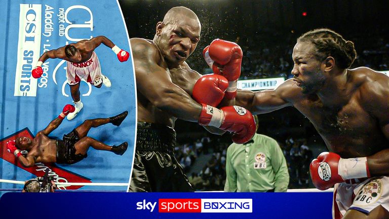 Lennox Lewis celebrates his eighth round knockout of Mike Tyson during their heavyweight championship fight
