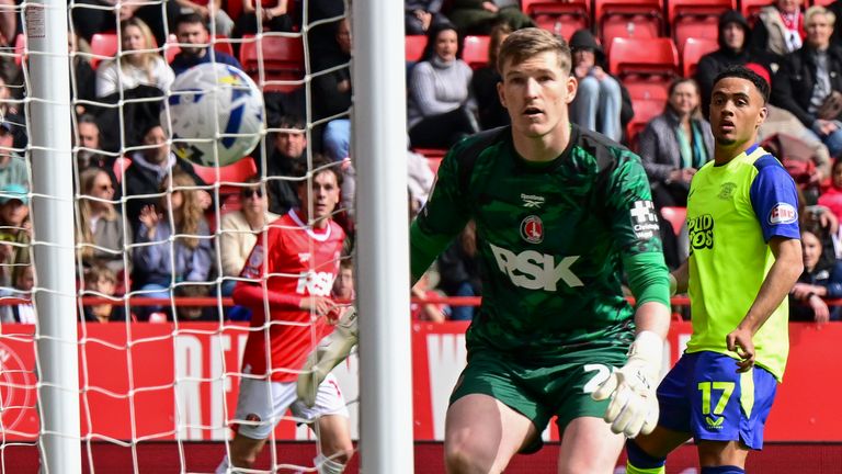 Preston's Lewis Dobbin (right) scores his side's equalising goal to make it 1-1 at The Valley