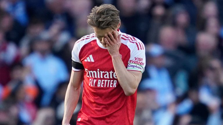 Martin Odegaard reacts after Arsenal fall 2-1 behind at Manchester City