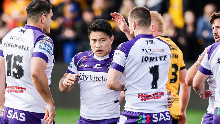 Mason Lino of Wakefield is congratulated by Max Jowitt.