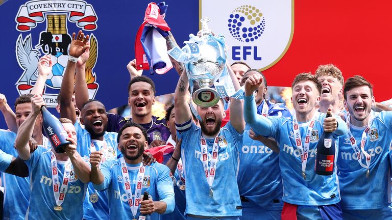Coventry City captain Matt Grimes lifts the Sky Bet Championship trophy after his team's 3-1 victory over Wrexham