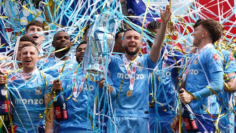 Coventry celebrate with the Championship trophy