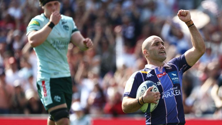 Bordeaux-Begles' French scrum-half Maxime Lucu celebrates after scoring a try during the European Rugby Champions Cup round of 16 rugby union match, between the Union Bordeaux B..gles (UBB) and the Leicester Tigers at the Stade Chaban-Delmas in Bordeaux on April 5, 2026. (Photo by ROMAIN PERROCHEAU / AFP)