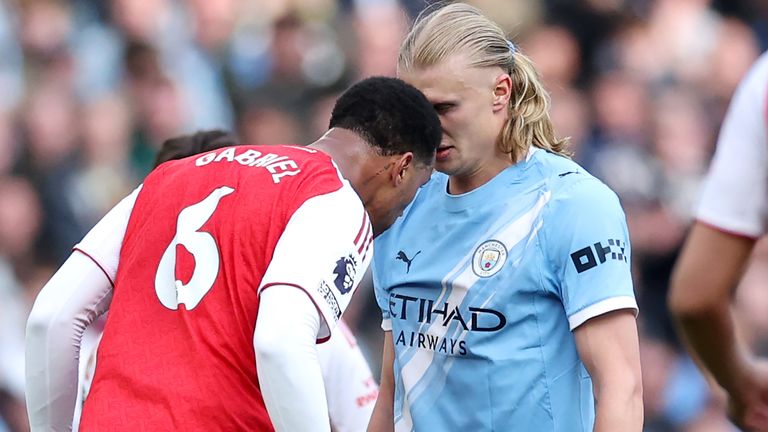 Gabriel clashes with Erling Haaland at the Etihad