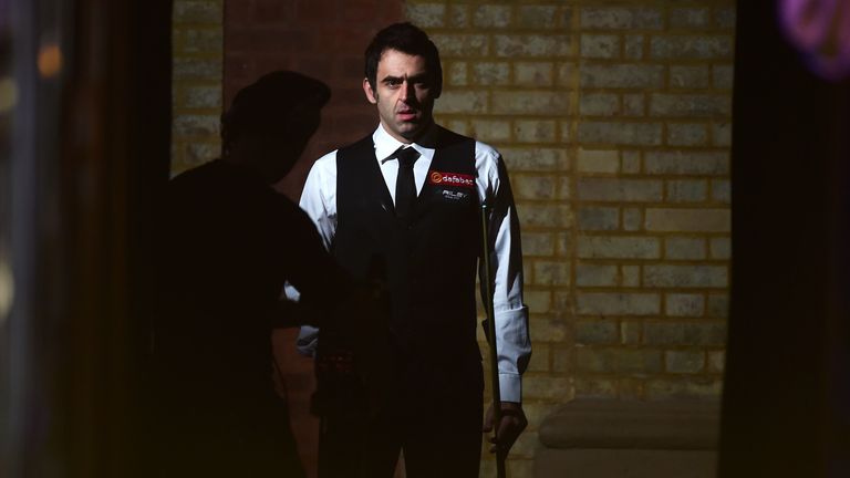 Ronnie O'Sullivan walks out to the arena during day three of the 2015 Dafabet Masters at Alexandra Palace, London.