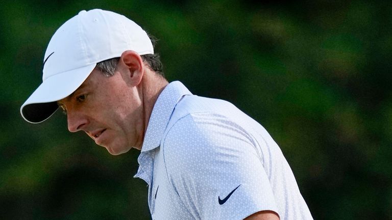 Rory McIlroy, of Northern Ireland, celebrates after a putt on the 13th hole during the second round of the Masters 