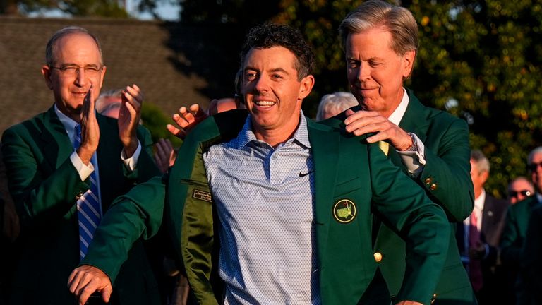 Augusta National chairman Fred Ridley puts the Green Jacket on Rory McIlroy