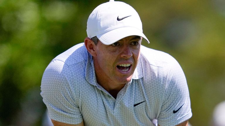 Rory McIlroy watches his tee shot on the fourth hole at Augusta