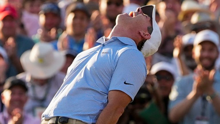 Rory McIlroy celebrates winning The Masters