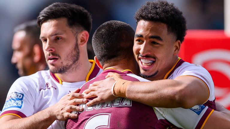 Huddersfield's Tanguy Zenon celebrates after scoring a try against York