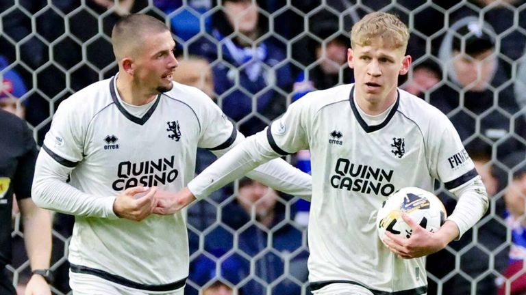 Zac Sapsford celebrates after pulling a goal back for Dundee United against Rangers