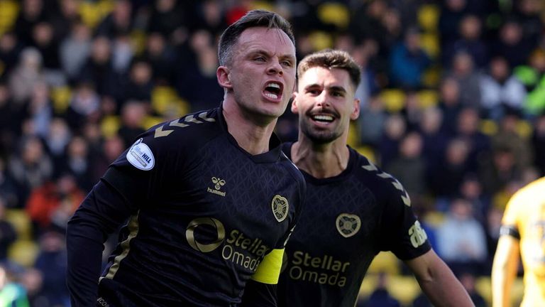 Lawrence Shankland celebrates after equalising for Hearts at Livingston
