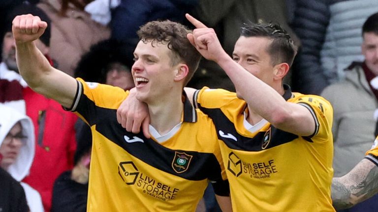 Lewis Smith celebrates after scoring Livingston's equaliser against Hearts