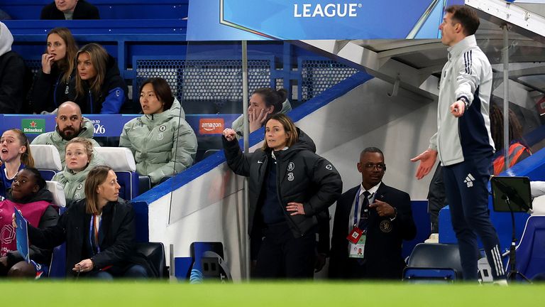 Sonia Bompastor watched the final moments of the Women's Champions League quarter-final through the side of the tunnel