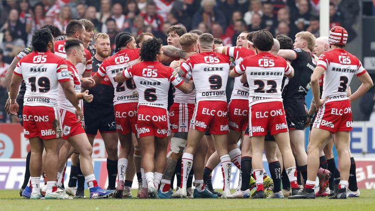 Players from both sides clash during the Betfred Super League match between St Helens and Wigan