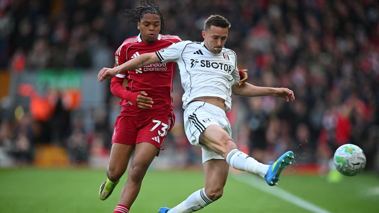 Timothy Castagne (right) and  Rio Ngumoha in Premier League action at Anfield