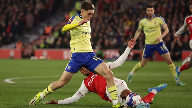 Southampton's Tom Fellows in action against Arsenal