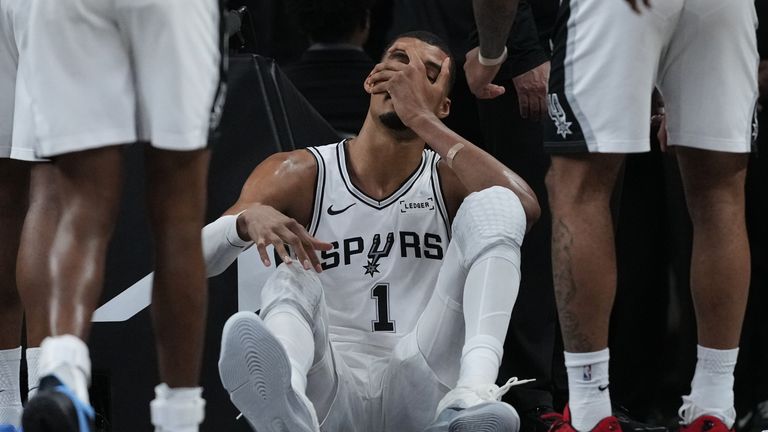 San Antonio Spurs forward Victor Wembanyama sits on the court after a hard fall (AP Photo/Eric Gay)
