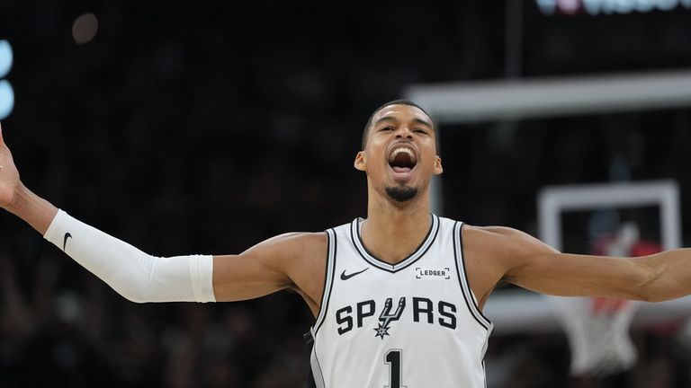 San Antonio Spurs forward/center Victor Wembanyama reacts during the first half in Game 5 of a first-round NBA playoffs basketball series against the Portland Trail Blazers, in San Antonio, Tuesday, April 28, 2026. (AP Photo/Eric Gay)