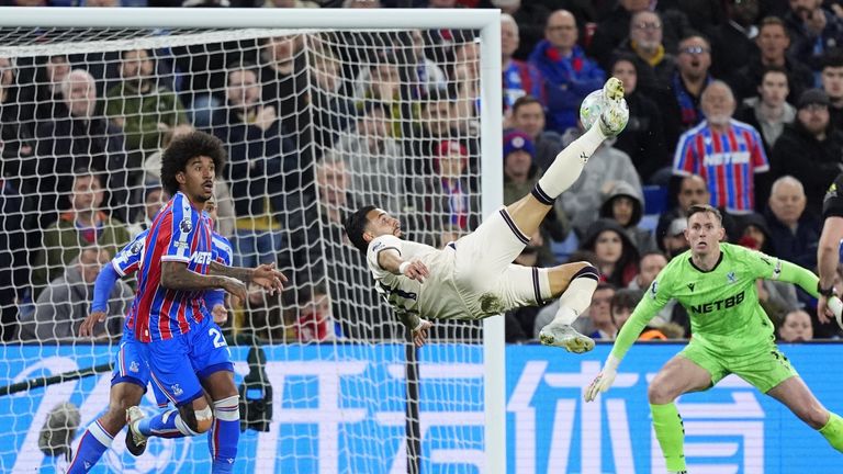 Taty Castellanos' acrobatic effort is kept out by Maxence Lacroix