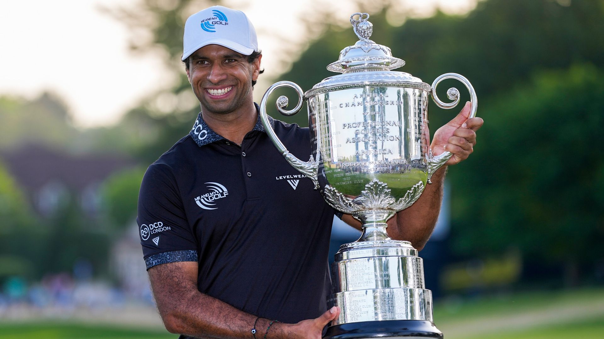 Who is PGA Championship winner Aaron Rai and why does he wear two gloves?