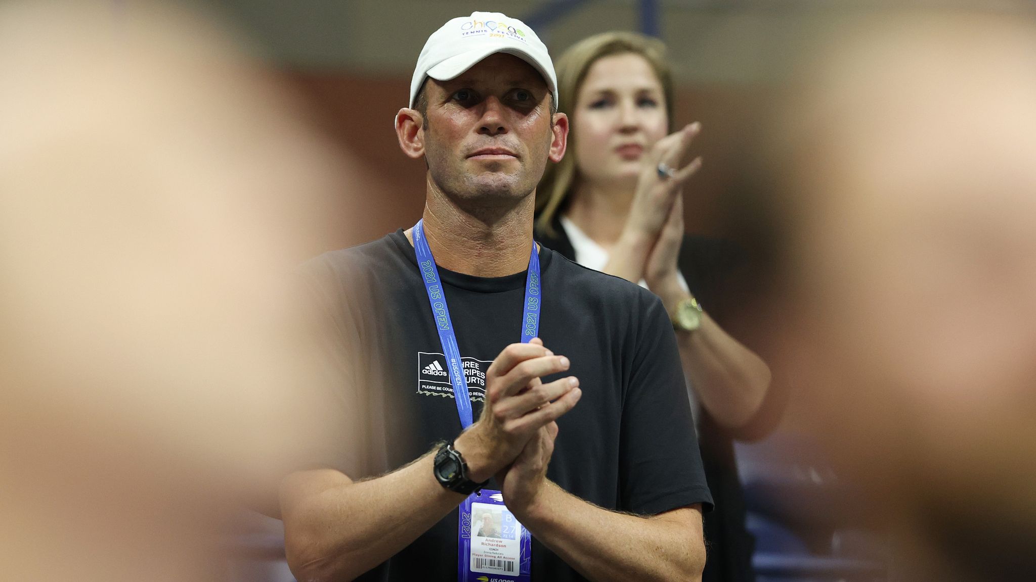 Andrew Richardson, coach of Emma Raducanu of Great Britain, cheers after Raducanu defeated Maria Sakkari of Greece during their Women’s Sing