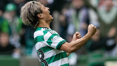 Daizen Maeda celebrates after scoring a vital late goal to earn Celtic victory against Hearts