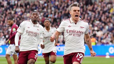 Arsenal's Leandro Trossard (right) celebrates scoring the opening goal of the game
