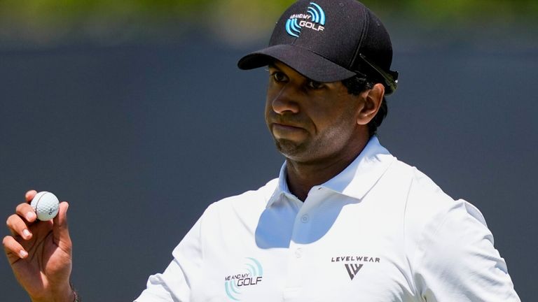 Aaron Rai, of England, waves on the first green during the third round of the PGA Championship 