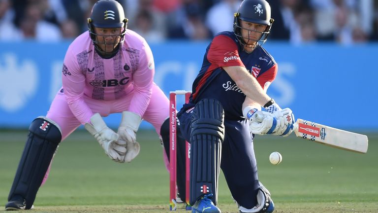 Middlesex wicketkeeper watches Kent's Sam Billings attempt a reverse sweep in their T20 Blast group match at Lord's