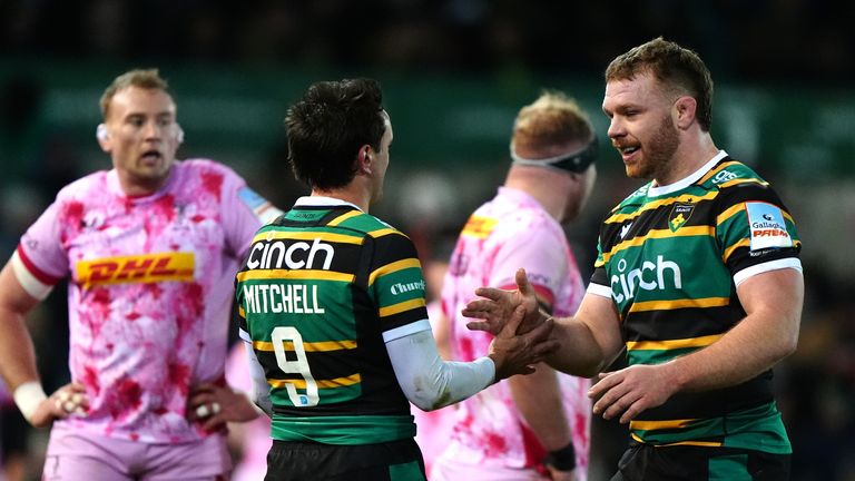 Northampton Saints' Alex Mitchell celebrates scoring their side's third try of the game against Harlequins