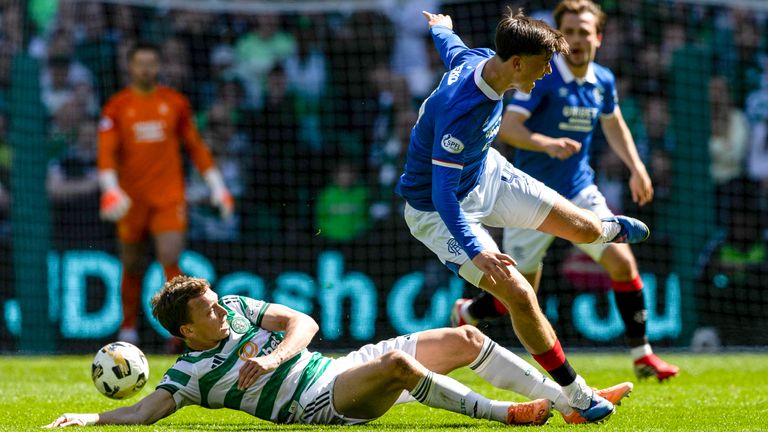 GLASGOW, SCOTLAND - MAY 10: Celtic...s Alistair Johnston fouls Rangers Mikey Moore during a William Hill Premiership match between Celtic and Rangers at Celtic Park, on May 10, 2026, in Glasgow, Scotland.   (Photo by Craig Williamson / SNS Group)